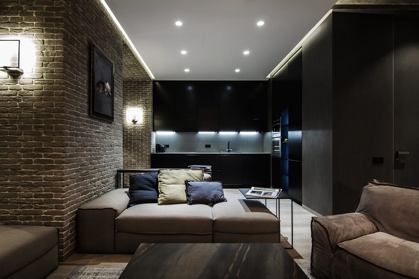60m2-es modern lakás sötét, meleg tónusokkal, elegáns berendezéssel, nagy, nyitott nappali térrel