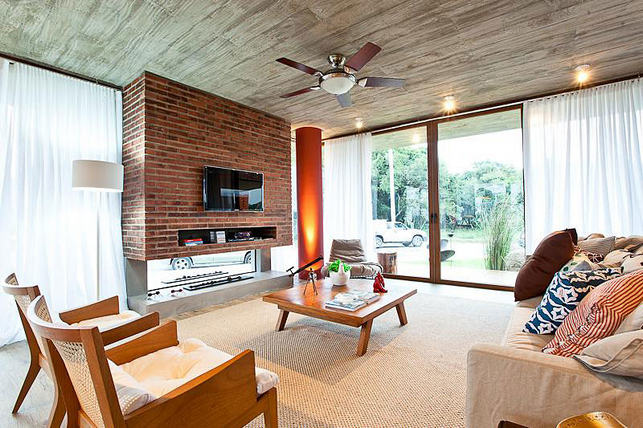 Kétoldalú kandalló design, kültéri és beltéri is egyben, a teraszon és a nappaliban is hangulatos 5