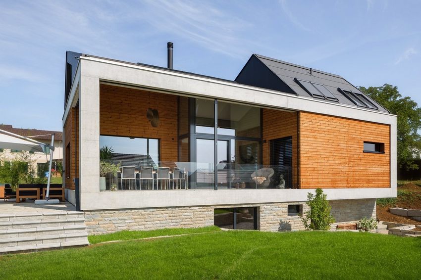 Családi ház egyszerű vonalakkal és formákkal - modern és indusztriális elemek - wohlgemuth & pafumi architekten