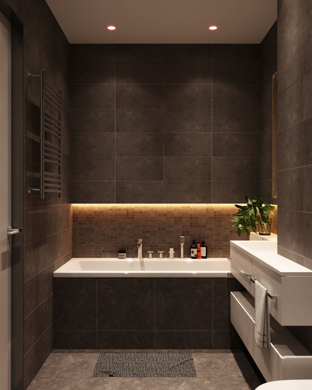 Fürdőszoba - sötét szürkésbarna falburkolat, fürdőkád, LED hangulatvilágítás, fehér bútor, mozaik