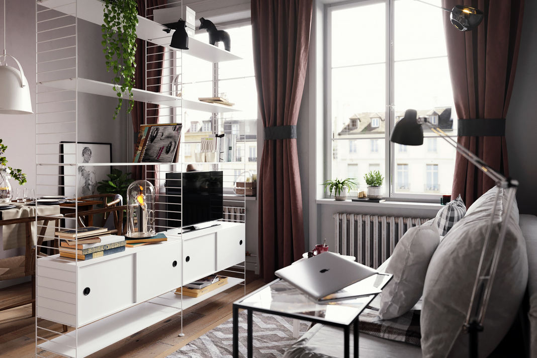 Kis lakás rendkívül ügyes és praktikus helykihasználással, egyszerű, de dekoratív berendezéssel