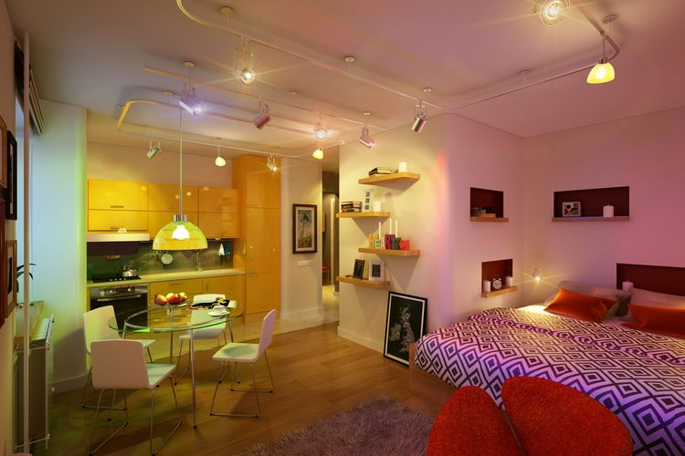 Sárga konyha, színes fények és helytakarékos megoldások egy fiatalos kis lakásban