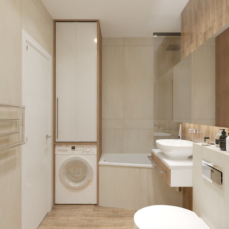 Kis fürdőszobában helyet nyerhetünk egy kisebb méretű aszimmetrikus káddal, így elférhet mellette a mosógép is, fölötte praktikus szekrénnyel