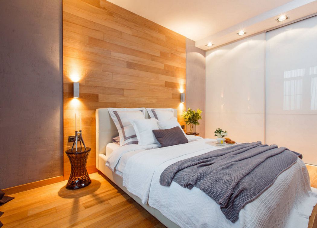 Hálószobában fantasztikusan látványos lehet a laminált padló ágy mögött sávban felrakva
