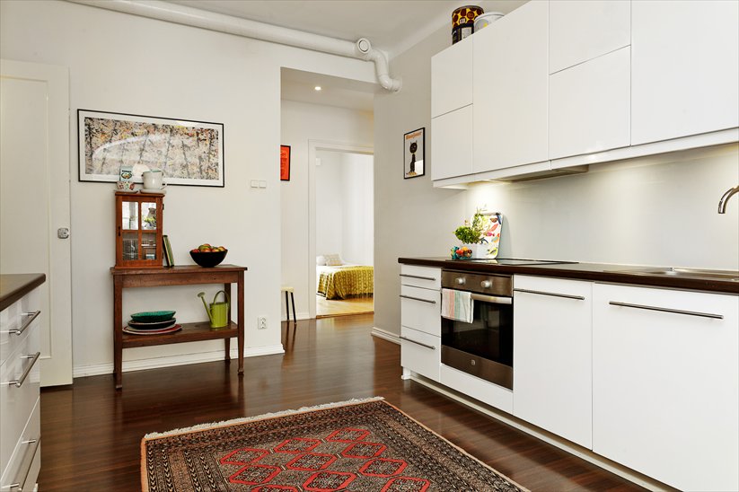 69nm-es lakás, sötét hall - végeredmény: tágas élettér, nyitott alaprajz, kényelmes konyha
