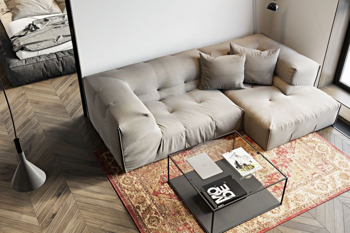 Férfias, letisztult otthon markáns elemekkel – 60m2-es kétszobás lakás monokróm színpalettával, szép fa padlóval, beton hatású falfestéssel