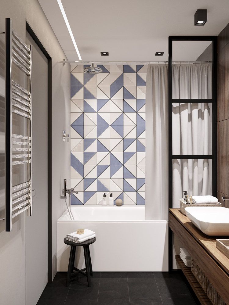 A geometrikus minta - ebben a fürdőszobában a kád mögötti falon - segít egy a szokványostól eltérő, látványos dekoráció kialakításában