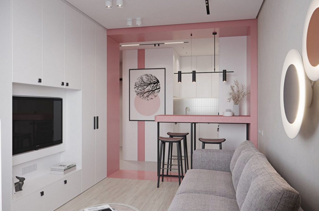Fehér és rózsaszín, modern berendezés 33m2-en, funkcionális kis lakás külön hálószobával