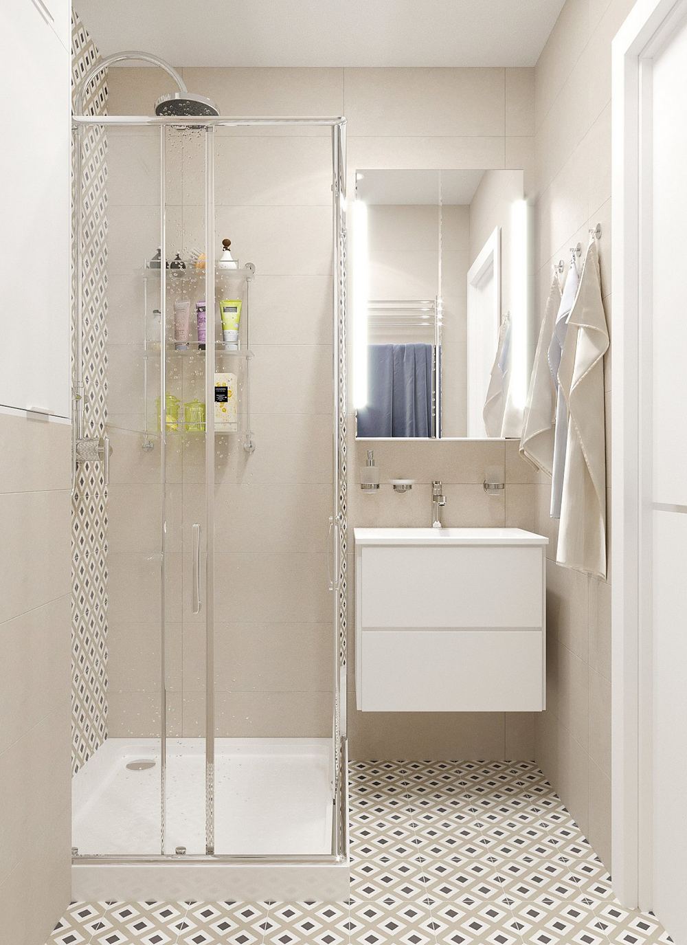 Kis fürdőszoba bézs és mintás csempével, zuhanyfülkével, tárolóhelyekkel