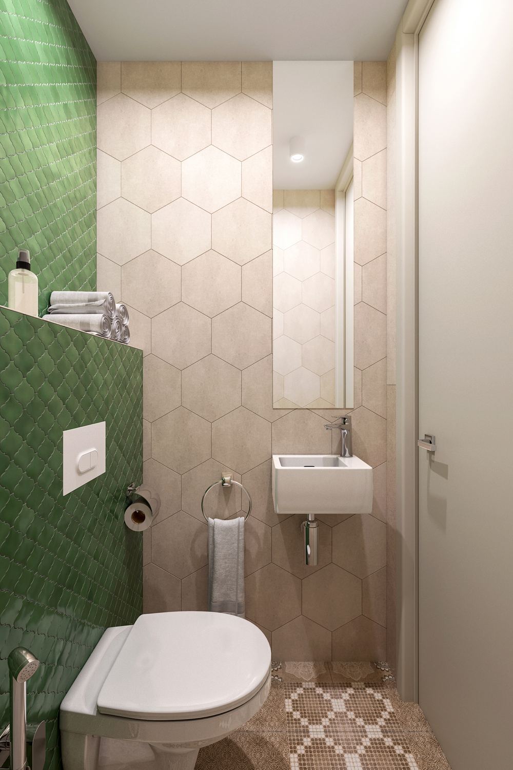 A bézs csempe a falon nagyobb méretű hatszögletű lapokból áll, a WC mögött a fal zöld, kisebb formátumú csempét kapott mutatós formával, a padlóburkolat mintás, a szaniterek fehérek