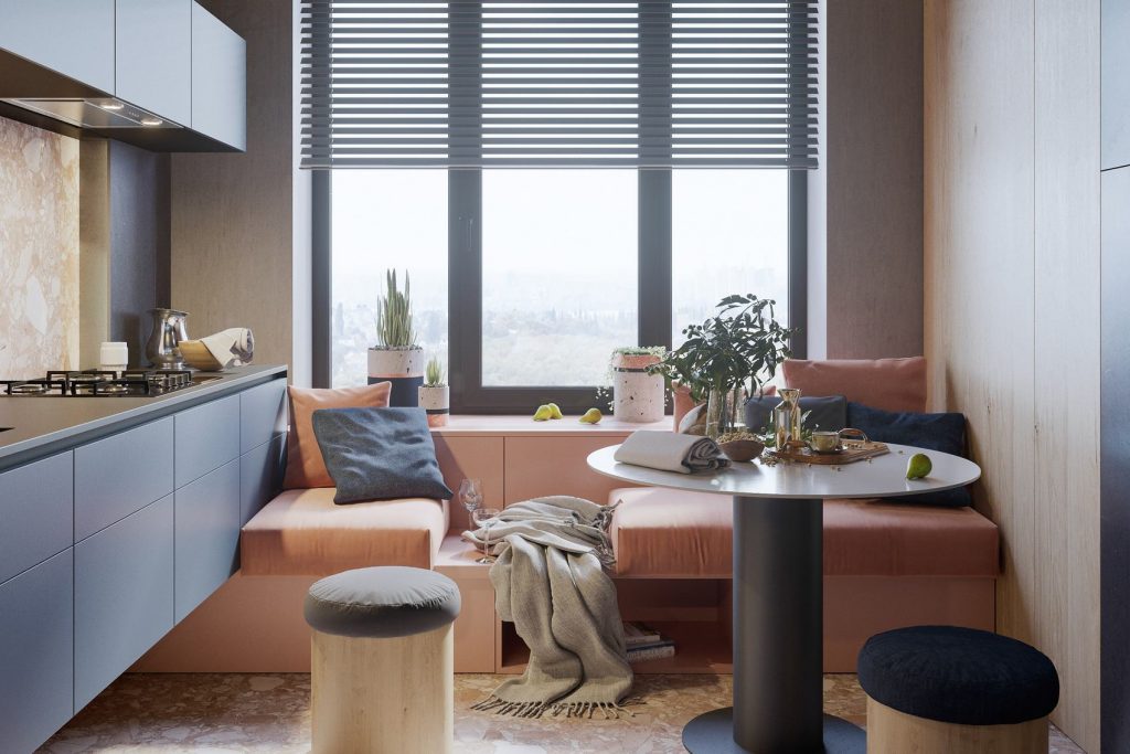 Modern 9m2-es konyha párnázott ülőhelyekkel az ablak előtt, társasági élethez tervezve