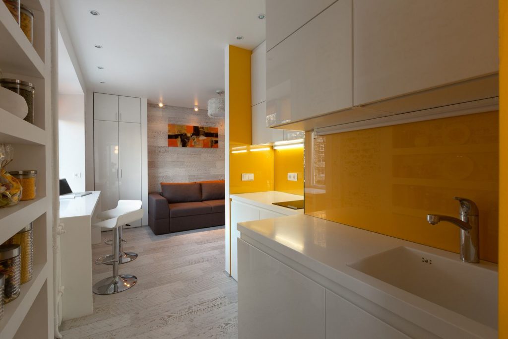 Kompakt, multifunkciós design 22m2-en, modern, praktikus berendezés kis lakás bérbeadásához