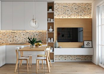 Nagy üveg tolóajtókkal két részre osztott tér egy stílusos és hangulatos kis lakásban - tiszta fehér, világos fa és terrazzo burkolatok szép kombinációja, kreatív berendezés