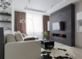 Fiatal nő otthona modern berendezéssel, kontrasztos színvilággal, 44m2-en nyitott elrendezéssel - kandalló, fényes felületek, fehér - szürke - fekete színpaletta, helytakarékos ágy