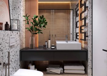 Modern, letisztult kis lakás berendezés, melyet fehér terrazzo burkolattal tettek különlegessé