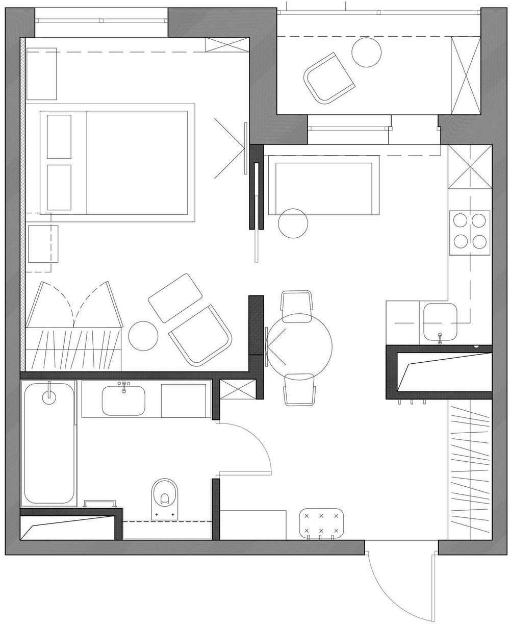 Trendi burkolatok és kék-fehér konyha egy bájos kis 39m2-es lakásban