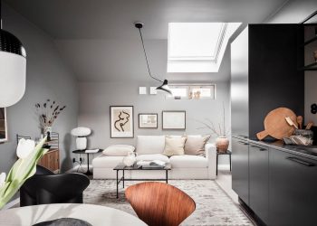 Stílusos és érdekes szürke enteriőr egy kis tetőtéri lakásban - fekete-fehér kontrasztok 34m2-en