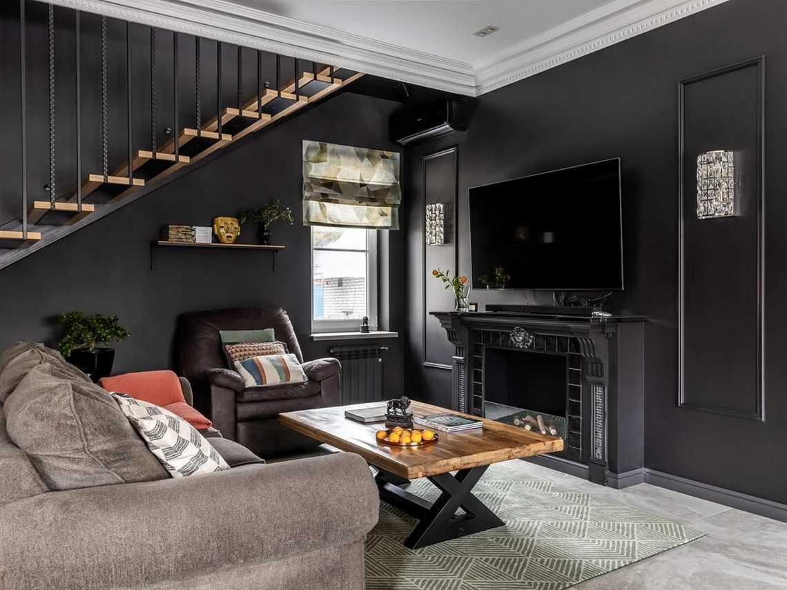 Borvörös hálószoba és fekete nappali-konyha - merész dekoráció egy kétszintes sorházban