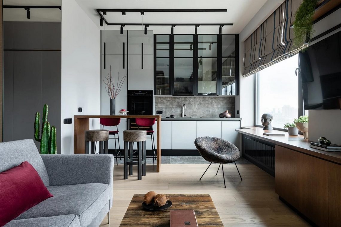 Sportsarok és otthoni munkahely - legénylakás funkcionális berendezéssel és férfias karakterrel