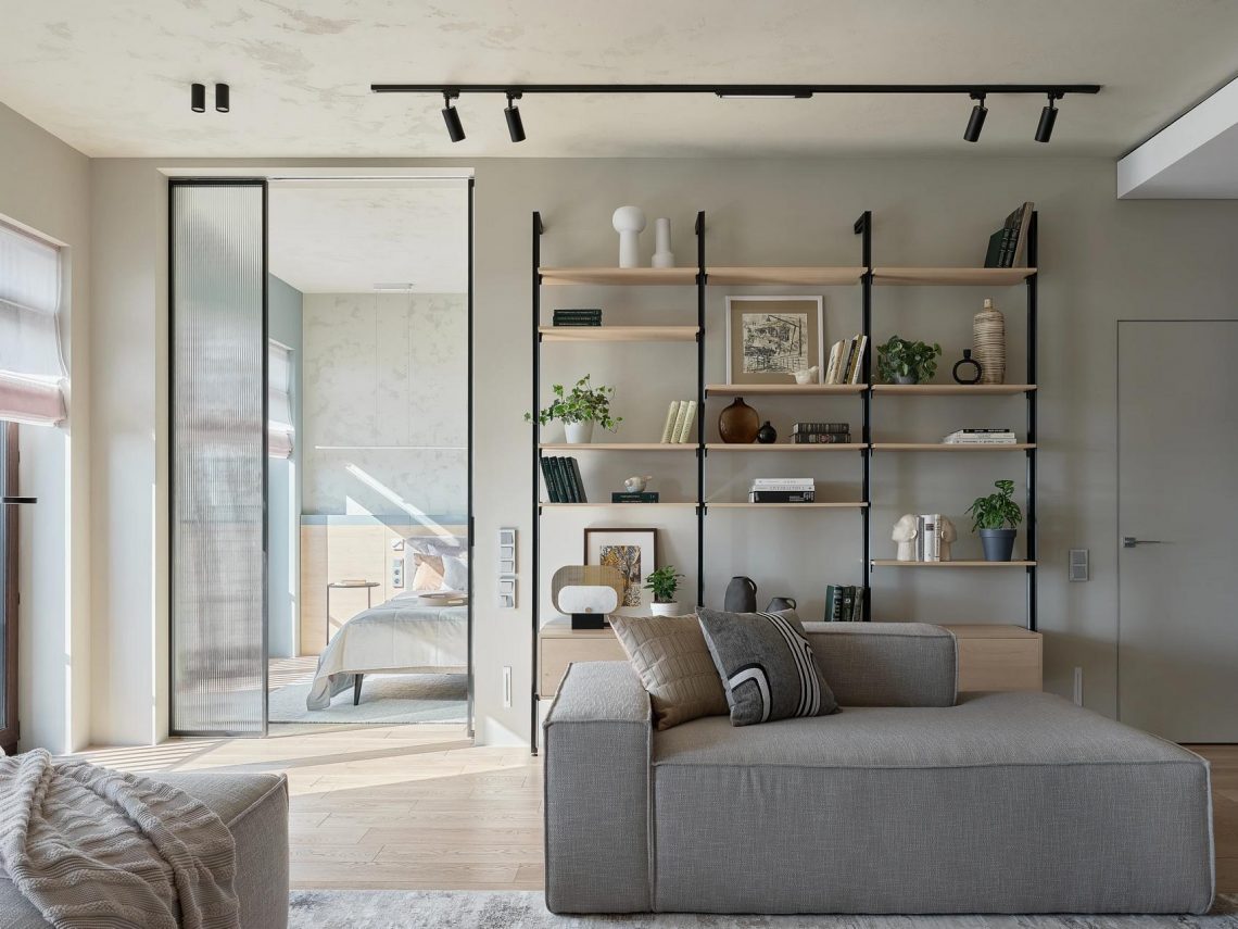 Egyedül élő férfi kényelmes lakása, a víz nyugodt árnyalataival a dekorációban