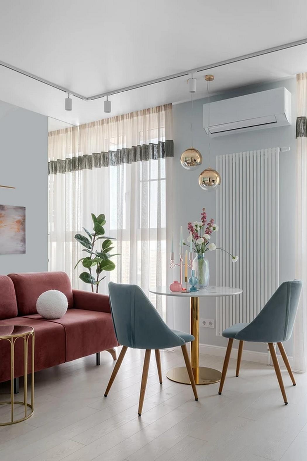 Álomotthon lágy színekkel és átgondolt részletekkel, fiatal nő és három cica 42m2-en