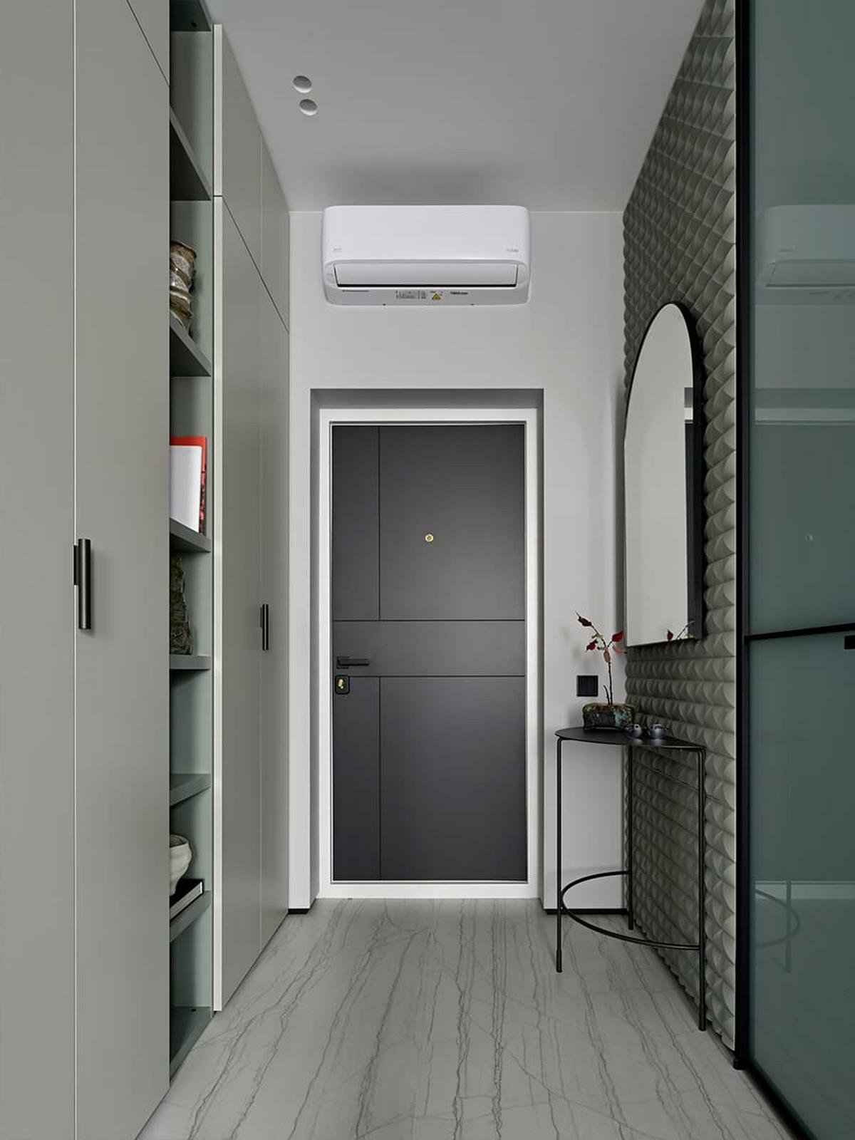 3D falpanel a fő dekorelem a fiatal férfinak berendezett modern lakásban 3D falpanel a fő dekorelem a fiatal férfinak berendezett modern lakásban