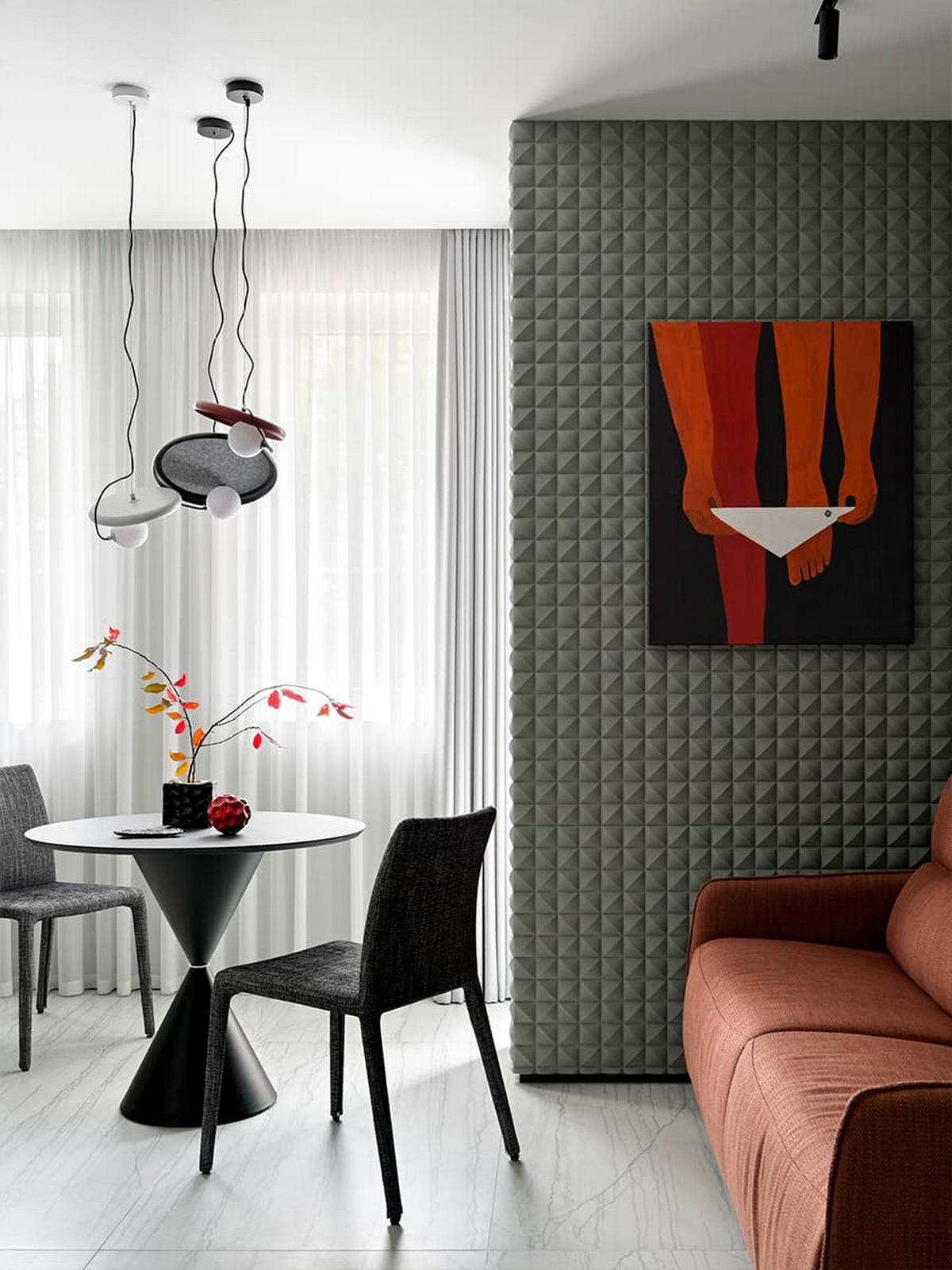 3D falpanel a fő dekorelem a fiatal férfinak berendezett modern lakásban 3D falpanel a fő dekorelem a fiatal férfinak berendezett modern lakásban