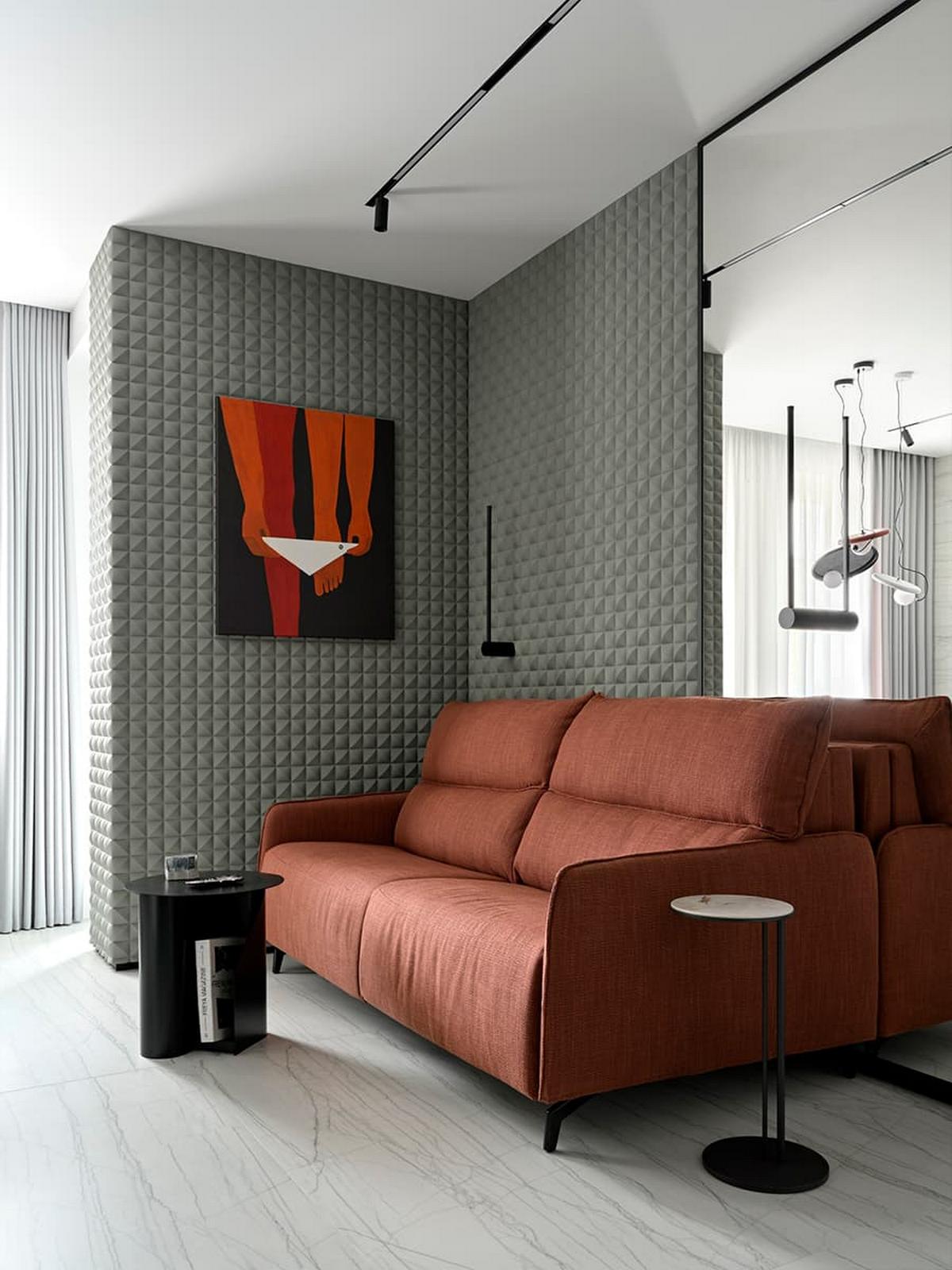 3D falpanel a fő dekorelem a fiatal férfinak berendezett modern lakásban 3D falpanel a fő dekorelem a fiatal férfinak berendezett modern lakásban