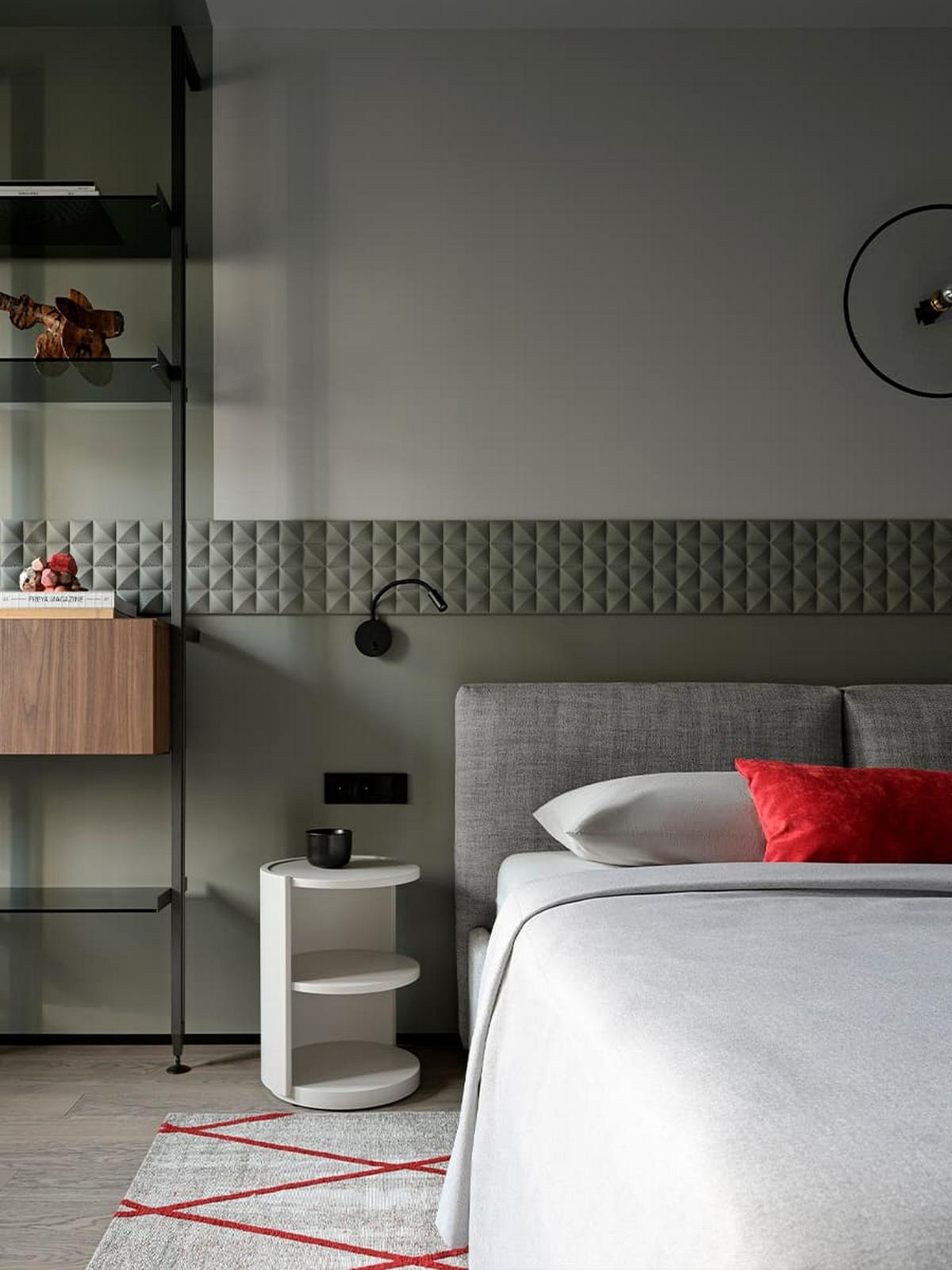 3D falpanel a fő dekorelem a fiatal férfinak berendezett modern lakásban 3D falpanel a fő dekorelem a fiatal férfinak berendezett modern lakásban