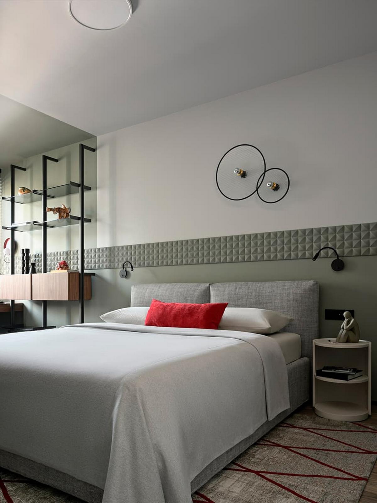 3D falpanel a fő dekorelem a fiatal férfinak berendezett modern lakásban 3D falpanel a fő dekorelem a fiatal férfinak berendezett modern lakásban