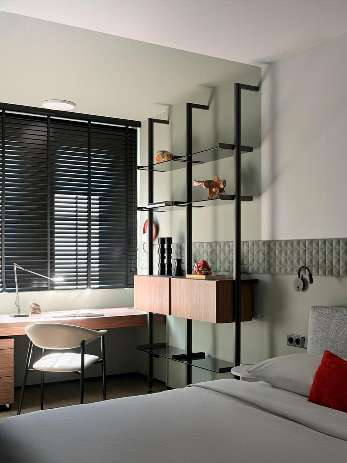 3D falpanel a fő dekorelem a fiatal férfinak berendezett modern lakásban 3D falpanel a fő dekorelem a fiatal férfinak berendezett modern lakásban