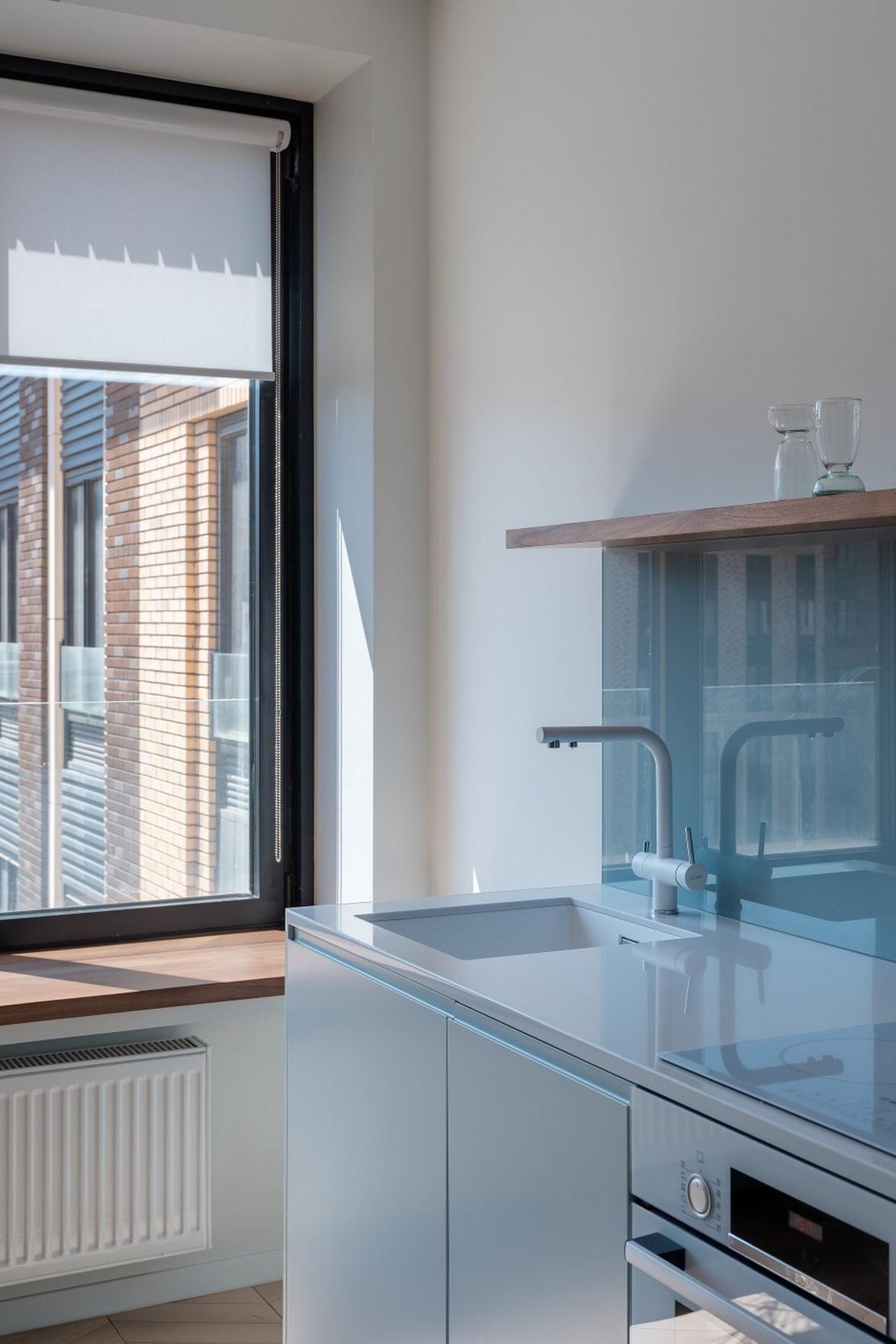 Kis konyhasziget és nyitott, modern, színekkel is díszített tér 40m2-es lakásban Kis konyhasziget és nyitott, modern, színekkel is díszített tér 40m2-es lakásban