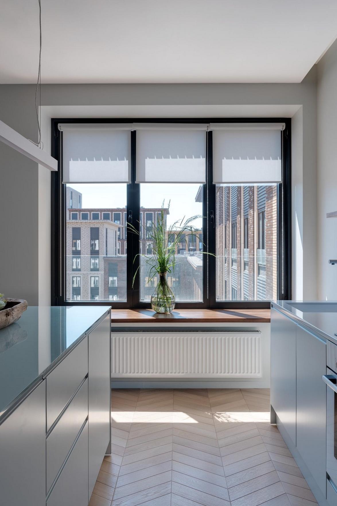 Kis konyhasziget és nyitott, modern, színekkel is díszített tér 40m2-es lakásban Kis konyhasziget és nyitott, modern, színekkel is díszített tér 40m2-es lakásban