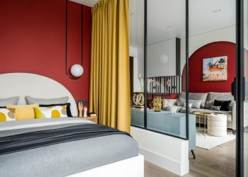 Élénk, színes berendezés fekete vonalakkal, játékos hangulat és tágasságérzet 35m2-en