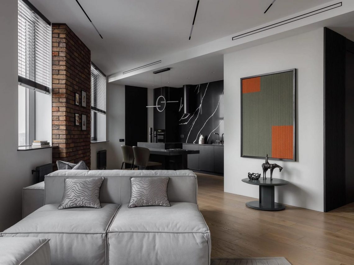 Karakteres legénylakás kontrasztos színekkel és anyagokkal berendezve