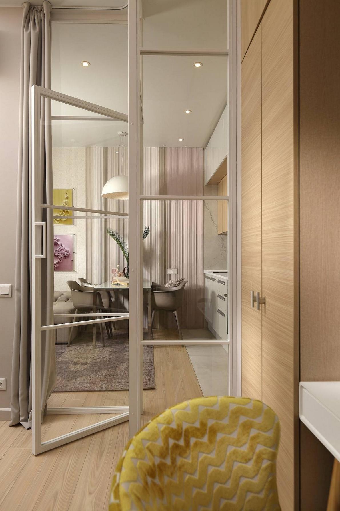 A tágasság illúziója ügyes térszervezéssel fiatal házaspár 34m2-es otthonában