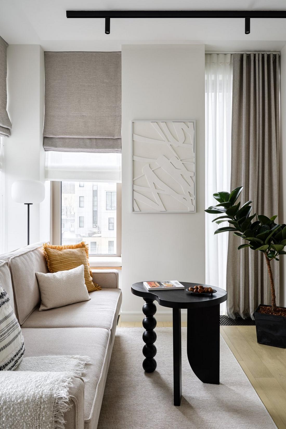 Otthonos és időtálló meleg monokróm lakásdekoráció