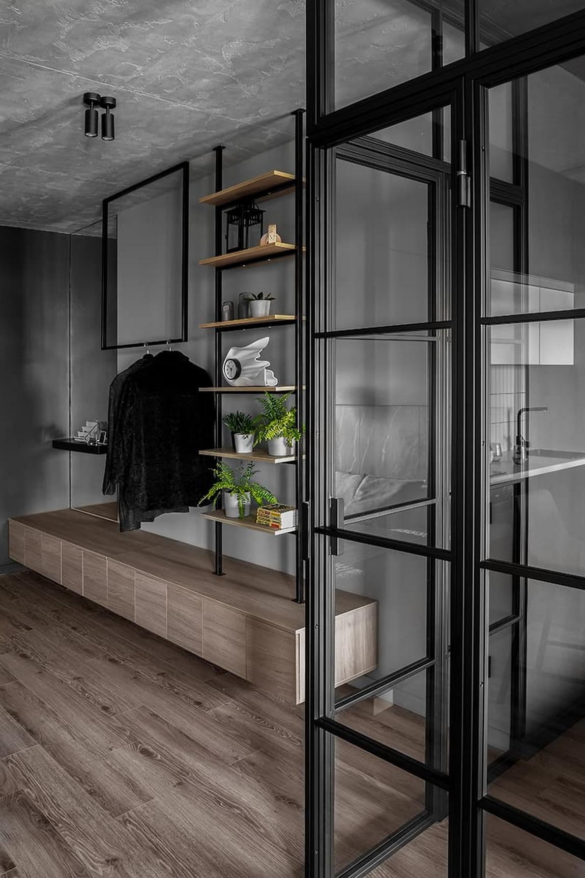 Kő, fa, üveg és dekorációs vakolat: karakteres berendezés férfi 42 m²-es lakásában