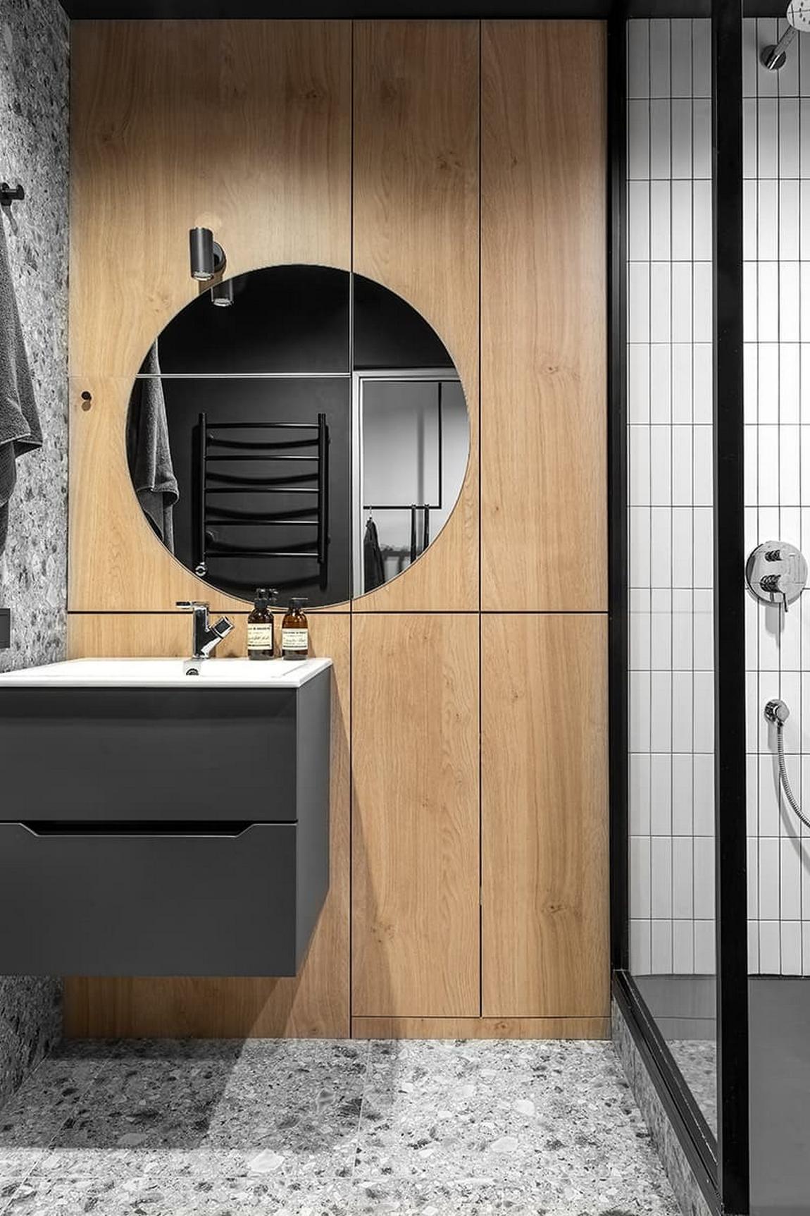 Kő, fa, üveg és dekorációs vakolat: karakteres berendezés férfi 42 m²-es lakásában