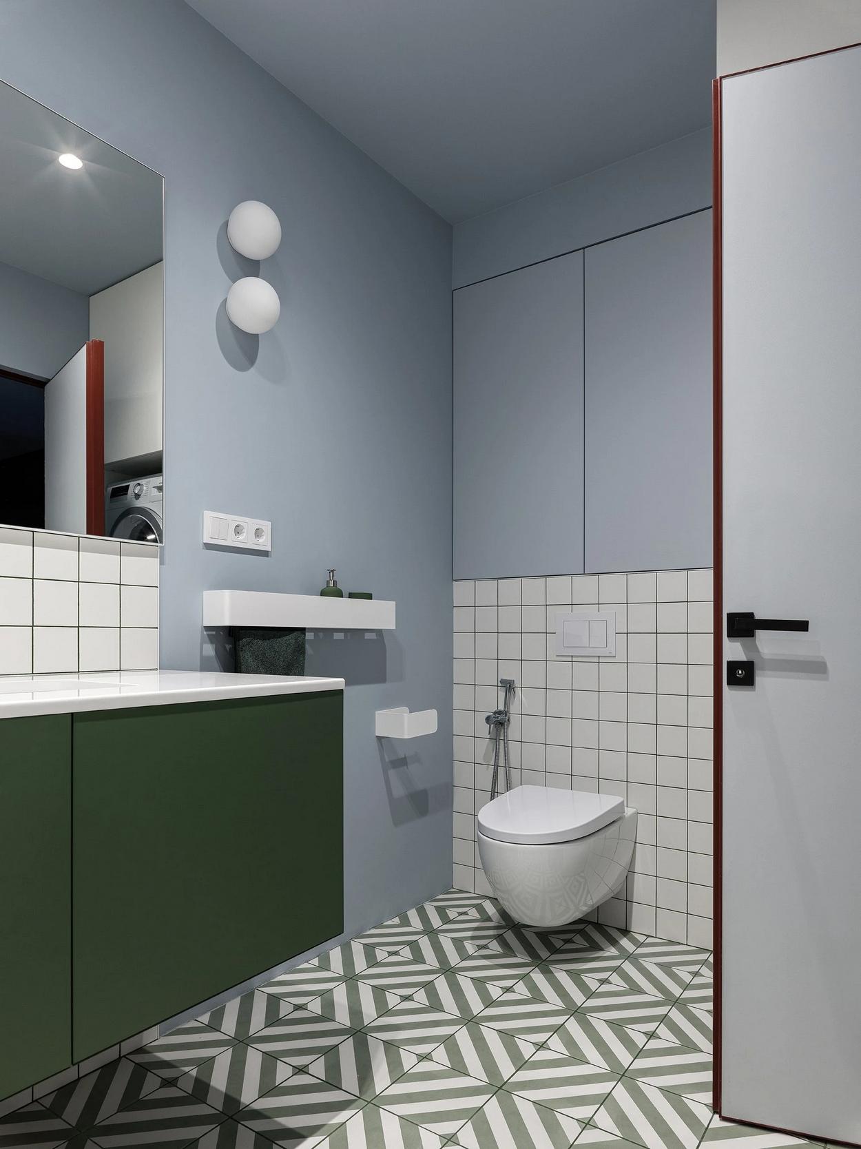 A férfias alapnak színekkel és érdekes formákkal adott érzelmi töltetet a lakberendező, 69 m²