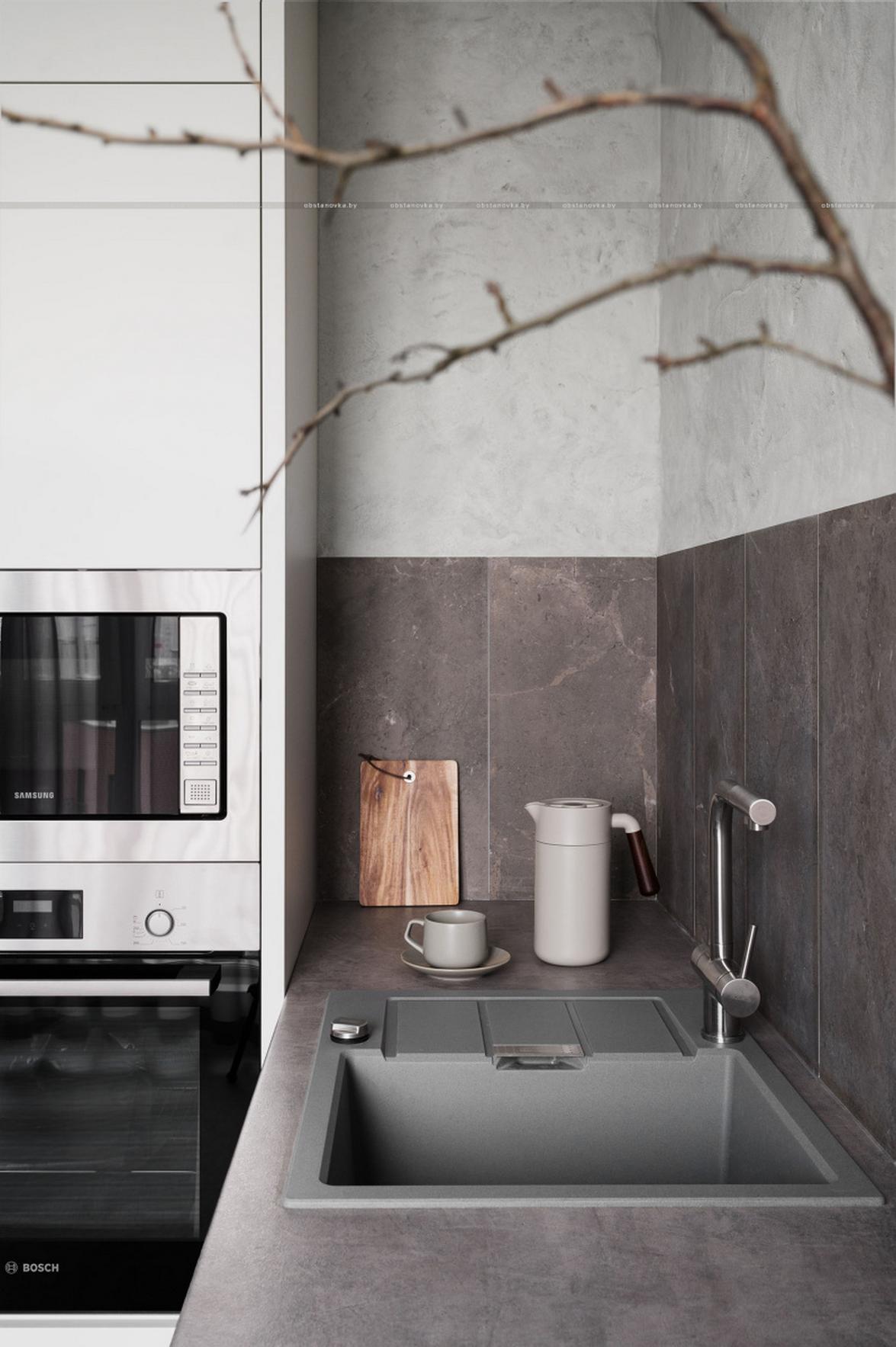 Konyha lett a fő látványelem: természetes kő és üde zöld árnyalatok 56 m²‑es lakásban