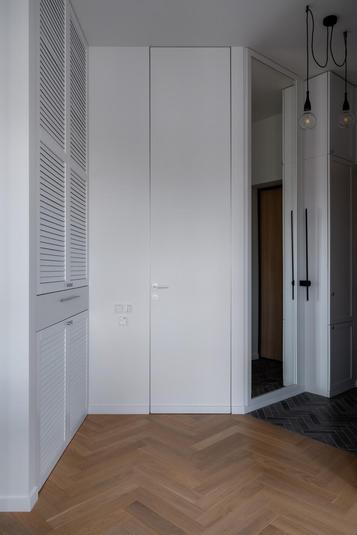 Fehér, szürke és fekete harmóniája 40 m2-es lakásban Fehér, szürke és fekete harmóniája 40 m2-es lakásban