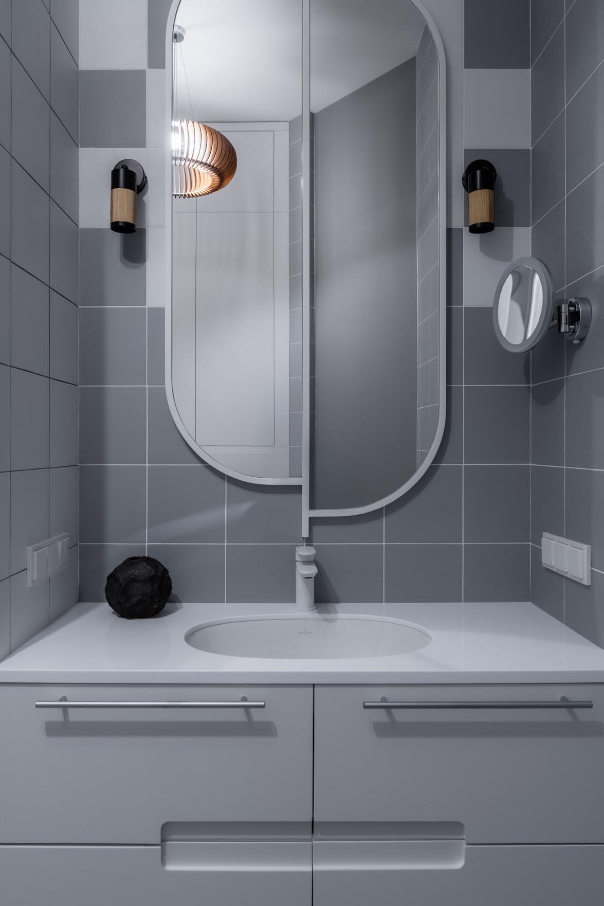 Fehér, szürke és fekete harmóniája 40 m2-es lakásban