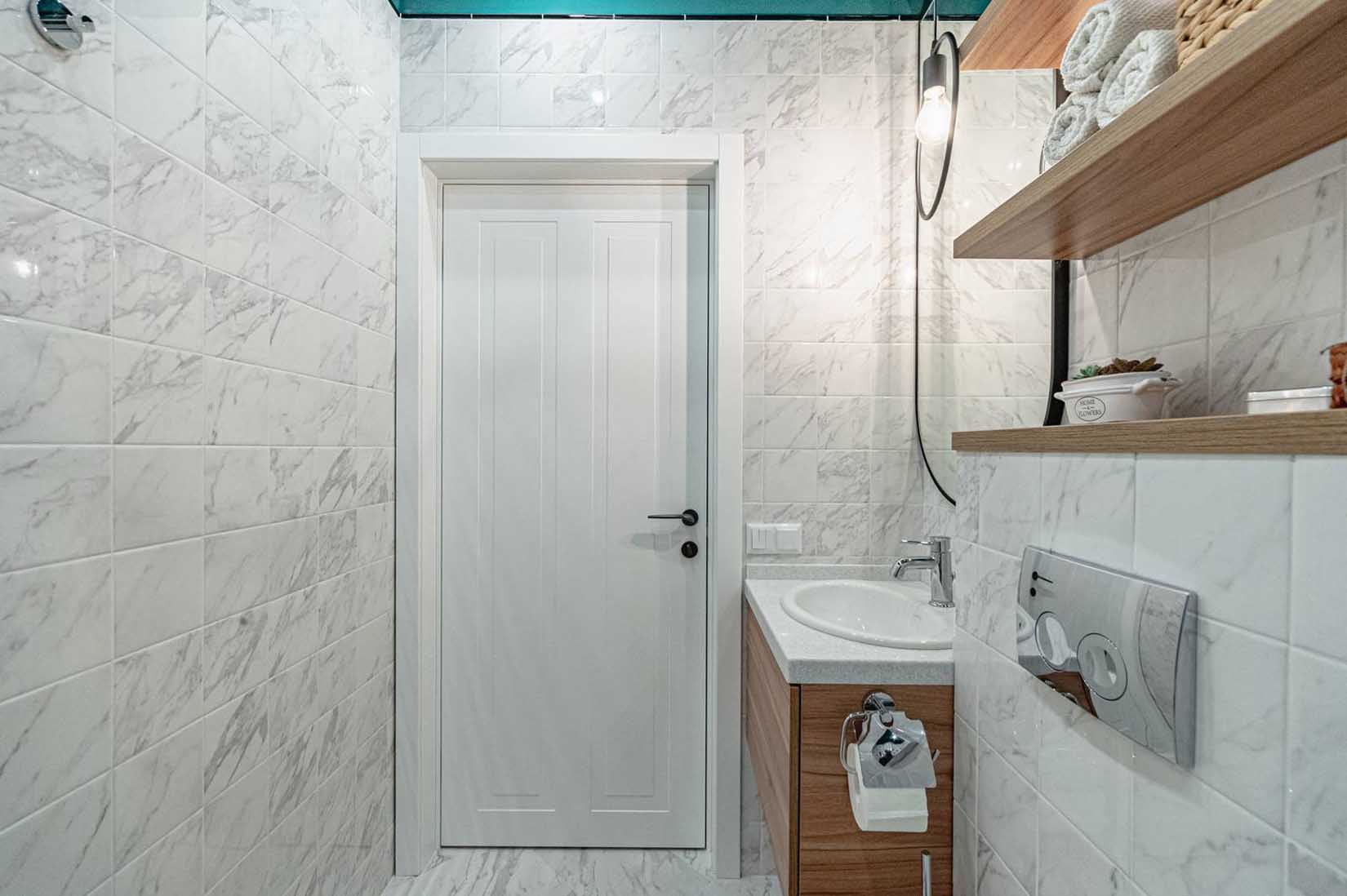 Funkcionalitás praktikus térszervezéssel és frissesség zöld árnyalatokkal Funkcionalitás praktikus térszervezéssel és frissesség zöld árnyalatokkal