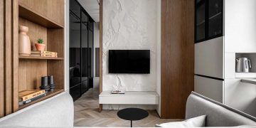 Nyugodt, minimalista berendezés egyszobás lakásban