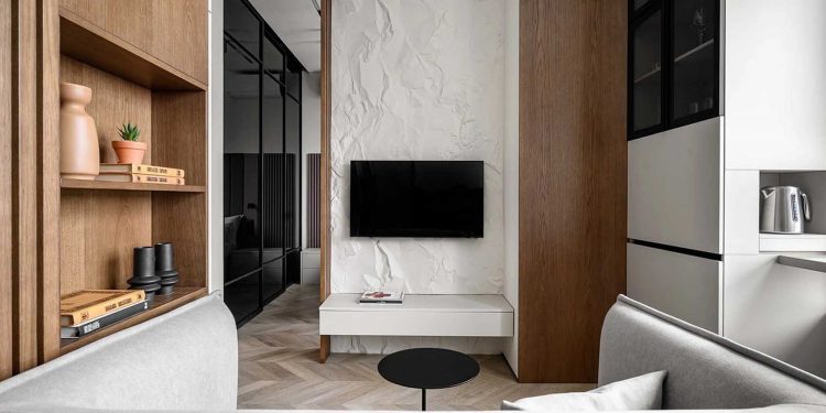 Nyugodt, minimalista berendezés egyszobás lakásban