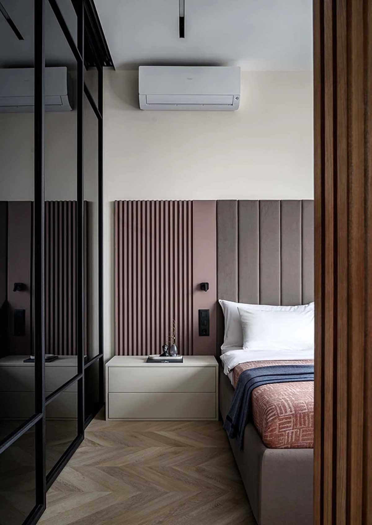 Nyugodt, minimalista berendezés egyszobás lakásban