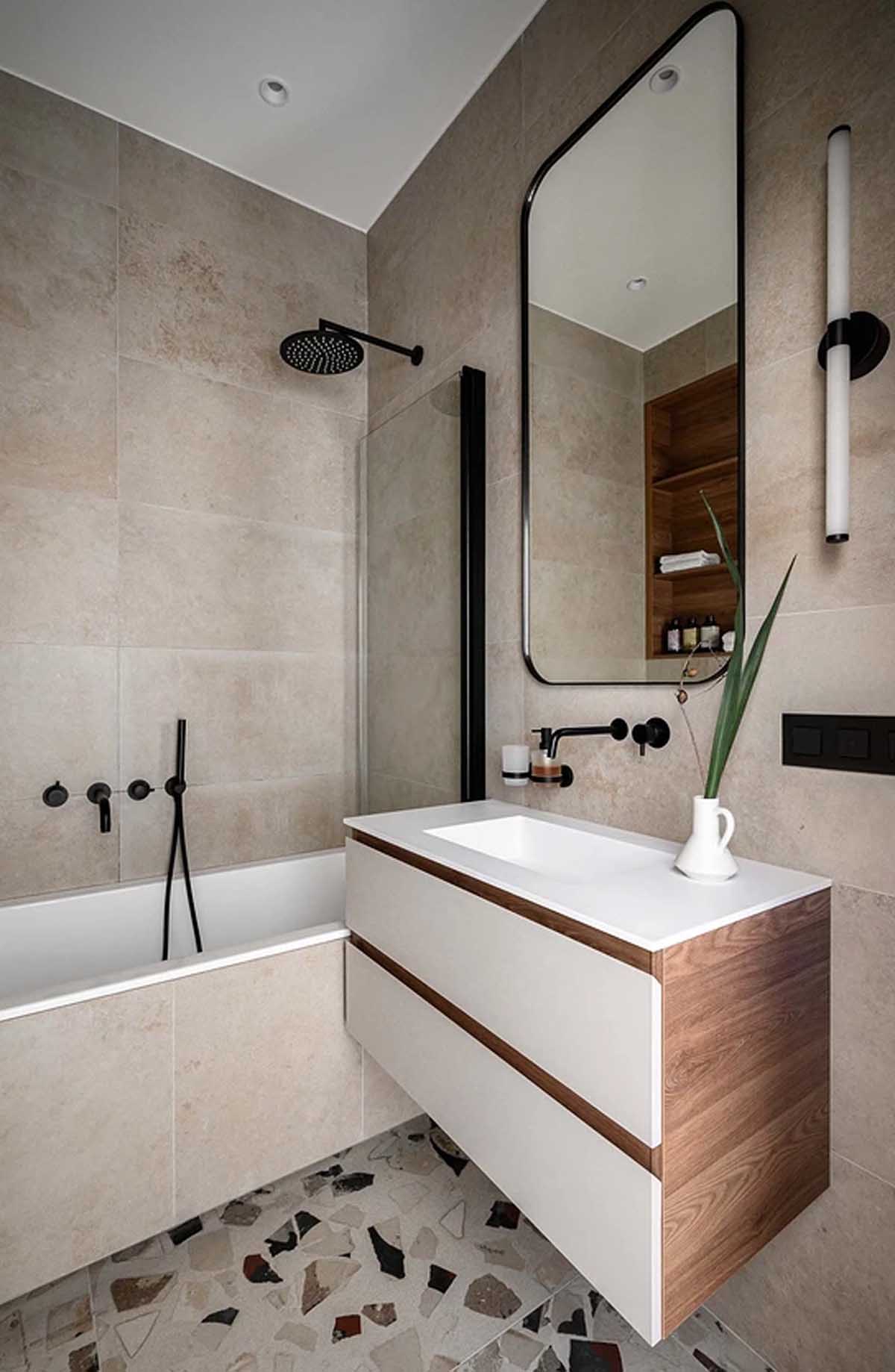 Nyugodt, minimalista berendezés egyszobás lakásban