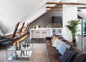 Tetőtéri lakás meleg és hűvös árnyalatokkal, felületekkel, kör alakú fürdőszobával