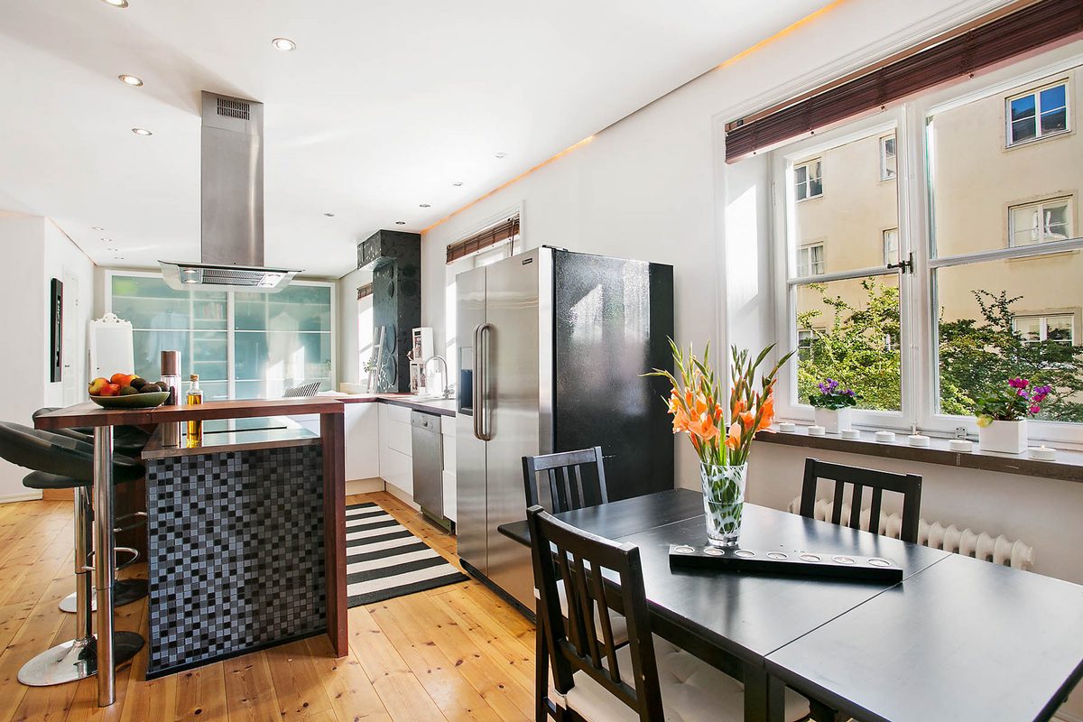 Teljesen nyitott tér egy 52nm-es lakásban - lakberendezés a társasági életre tervezve Teljesen nyitott tér egy 52nm-es lakásban - lakberendezés a társasági életre tervezve